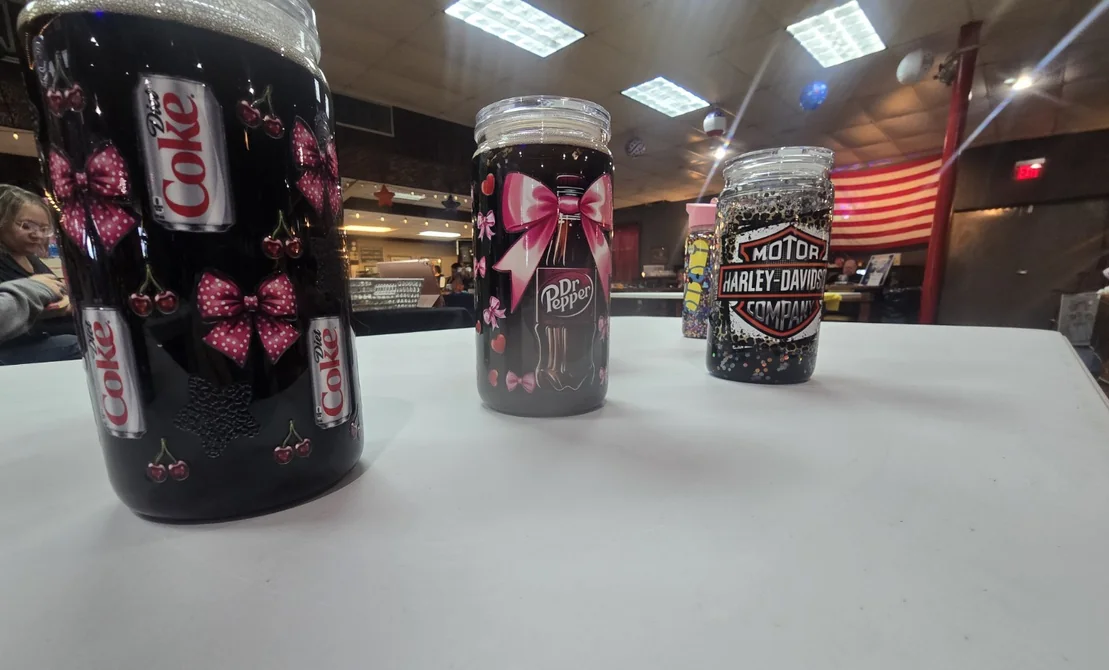 Adult drinkware lineup with personalized beverage-inspired tumbler designs